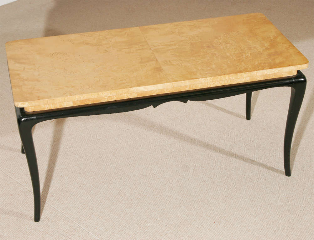 A BirdsEye Maple Burr coffee table on ebonised base at 1stDibs